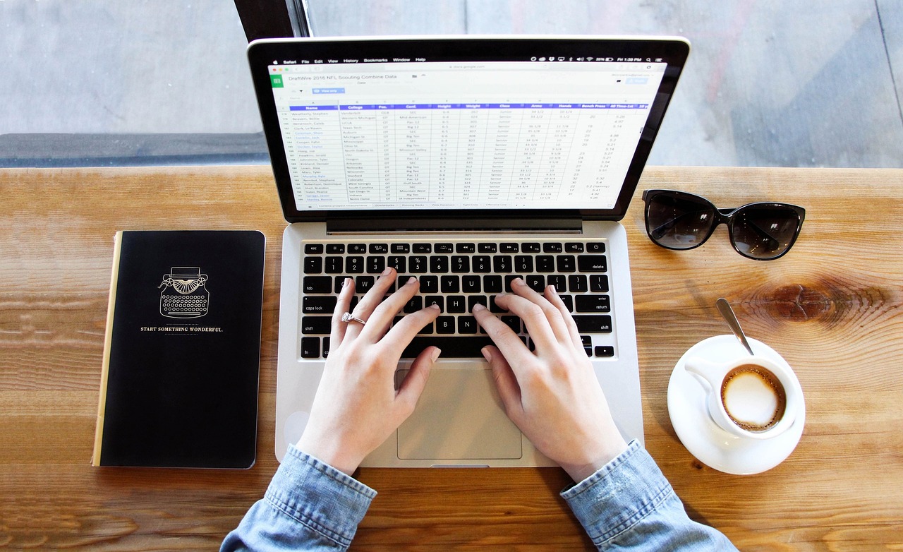 Person typing on a laptop